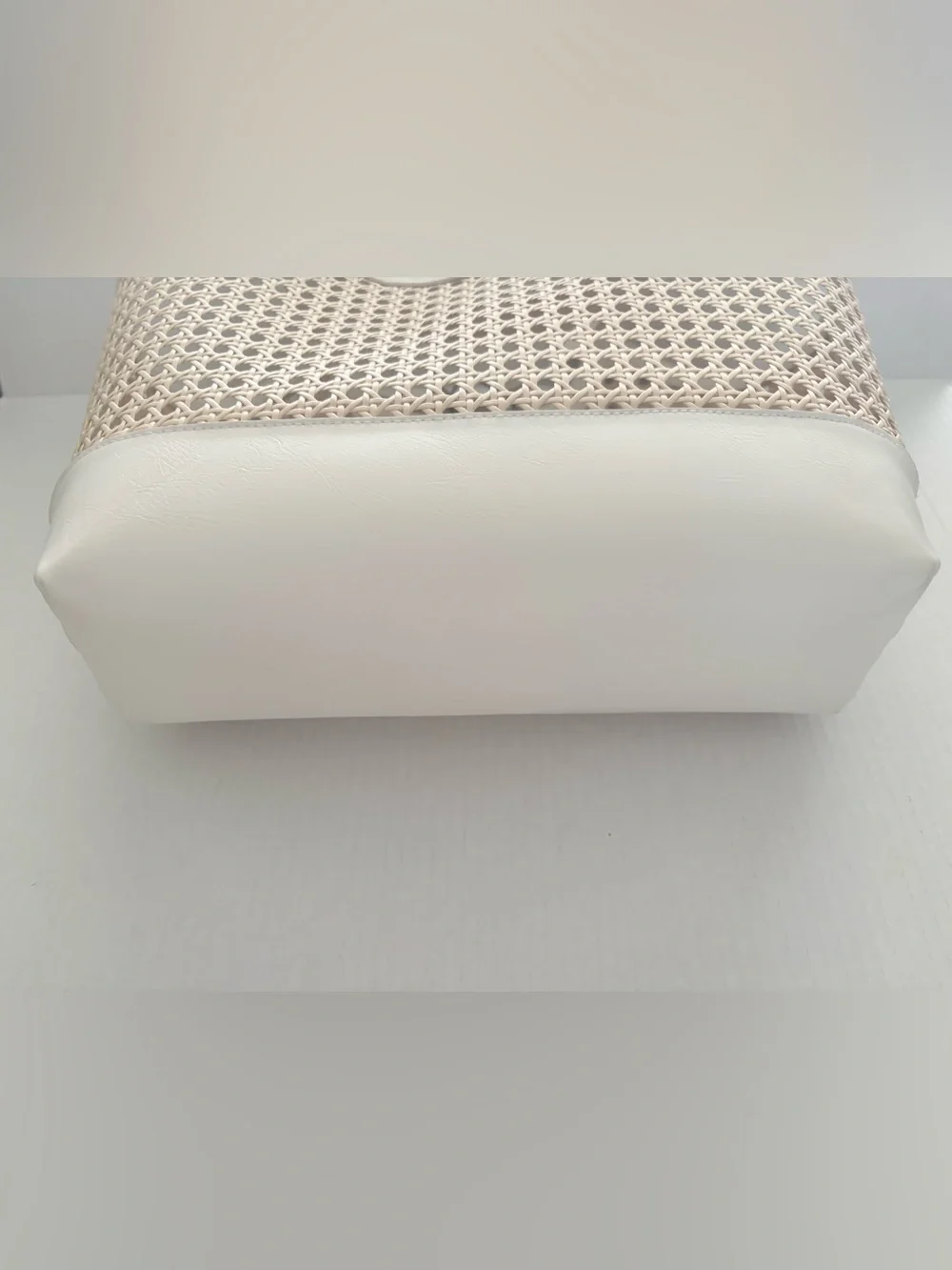 A New Day Straw Caning Tote Bag natural woven cane design white trim detailing.
